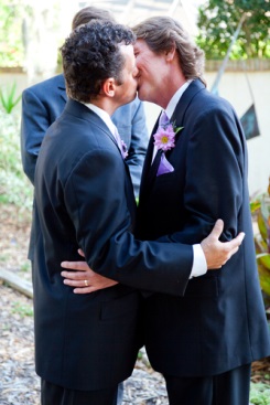 Two grooms kiss after ceremony L.A. Banquets