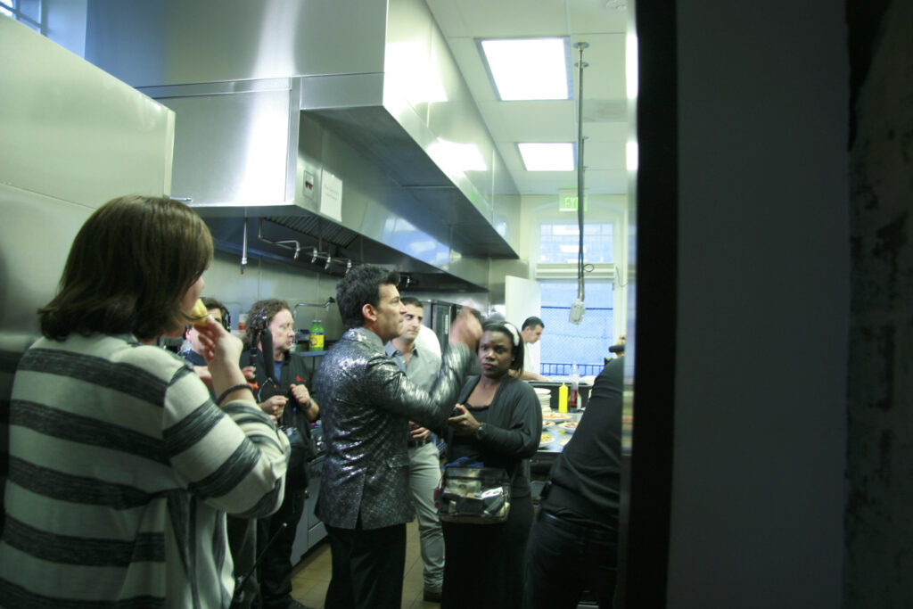 a group of people standing in a room