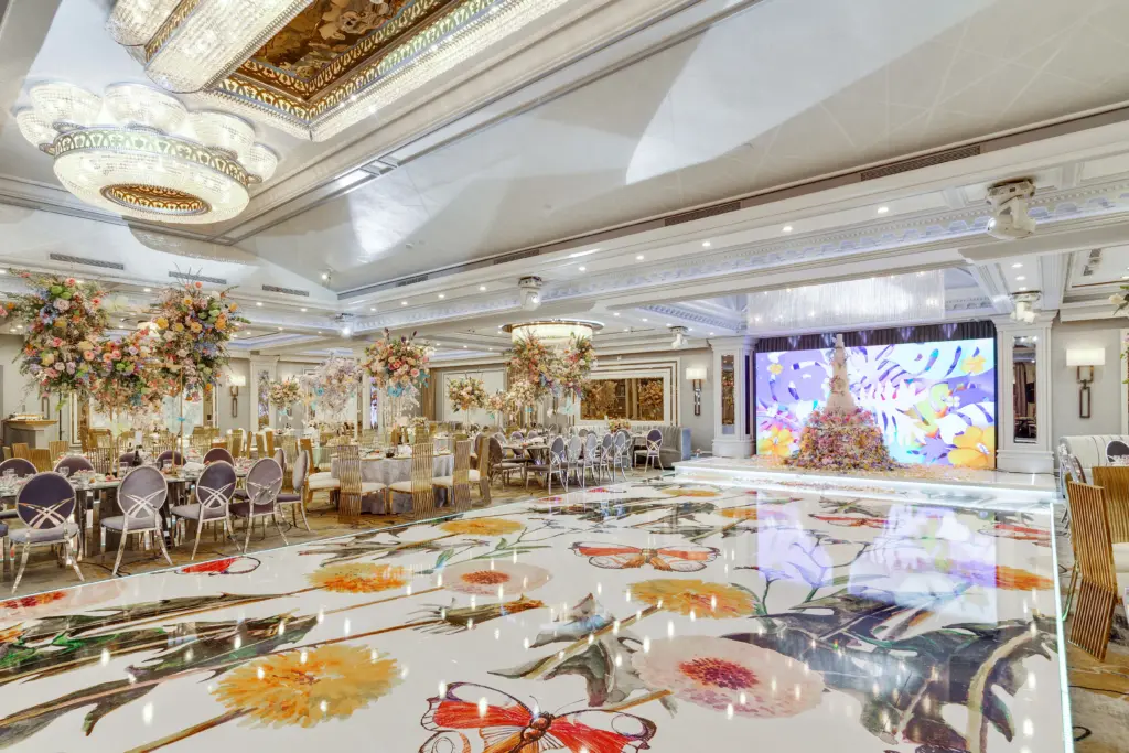 Glenoaks Ballroom with a colorful floral design projected onto the dance floor