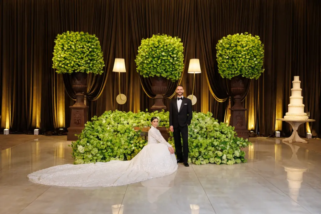 Wedding guests dancing energetically during the reception
