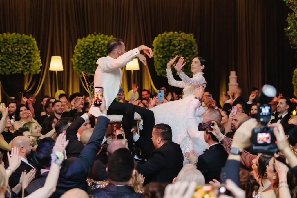 Wedding guest dancing happily on the reception floor