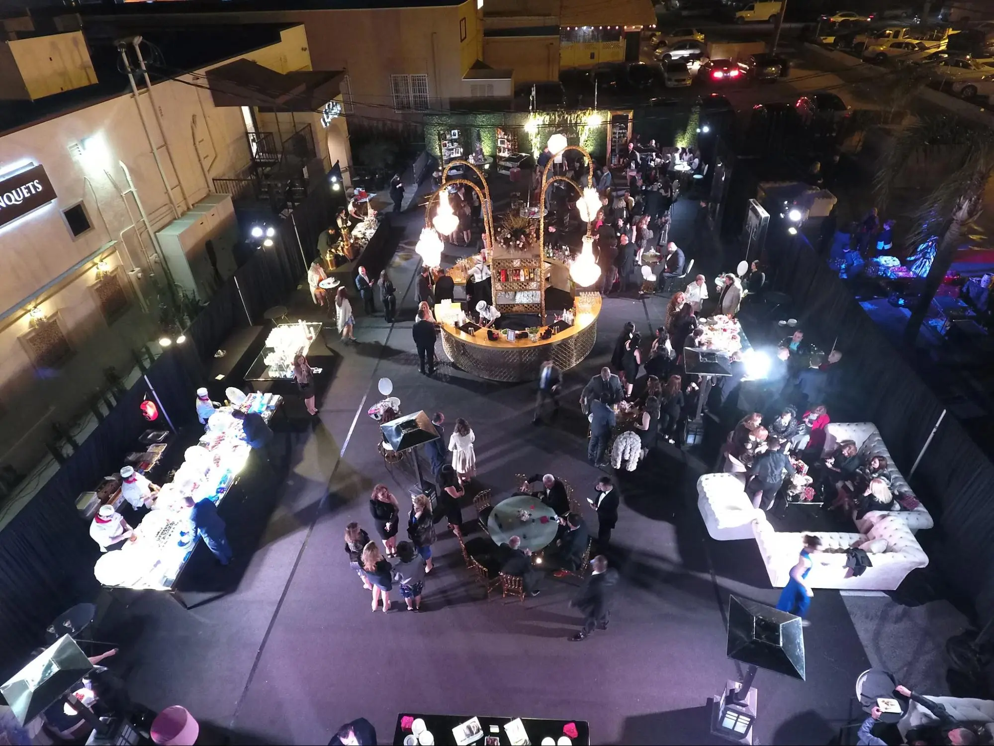 Aerial night view of an outdoor cocktail hour at L.A. Banquets
