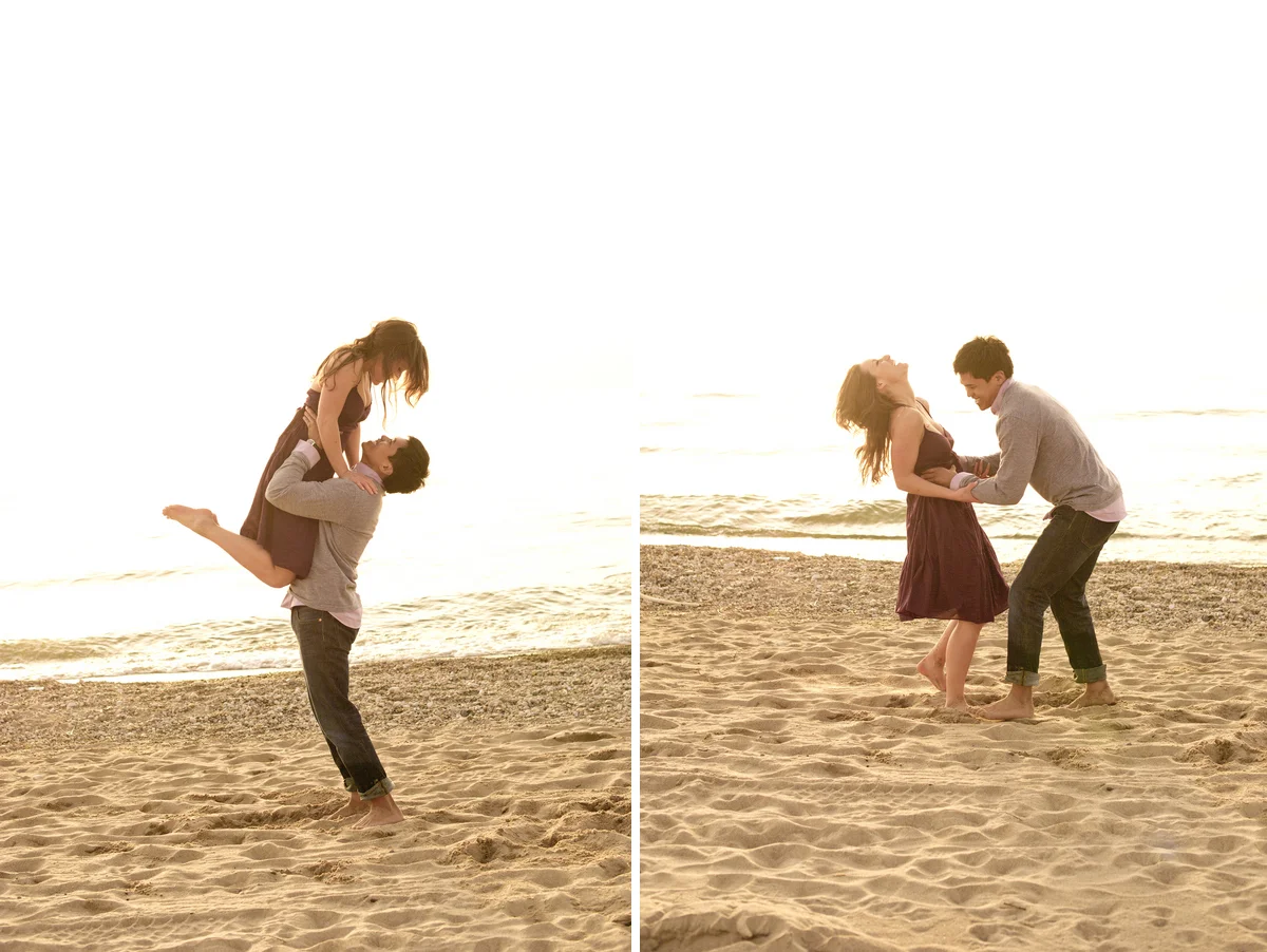 Couple playing and dancing together on the beach at sunset