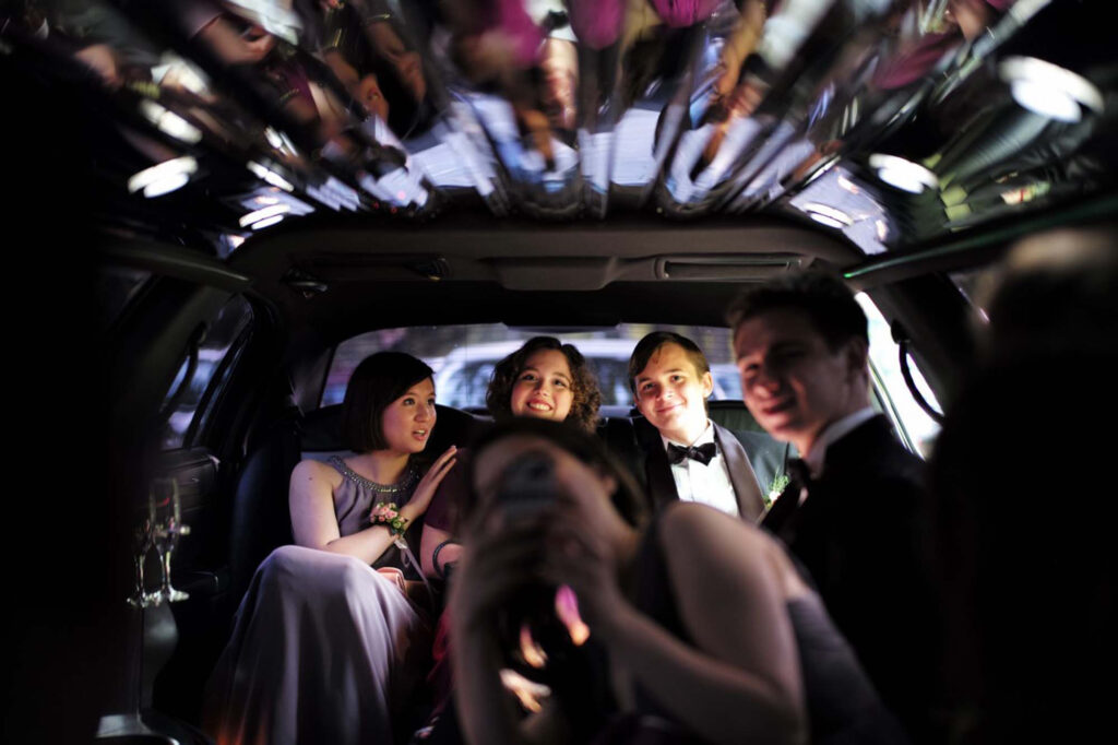 a group of people in a car