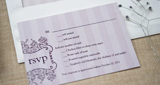 Wedding RSVP card with a meal-choice checklist and purple envelope