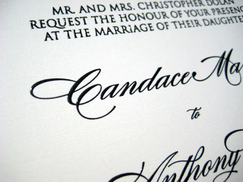 Tropical wedding invitation with palm leaf illustrations and an RSVP panel