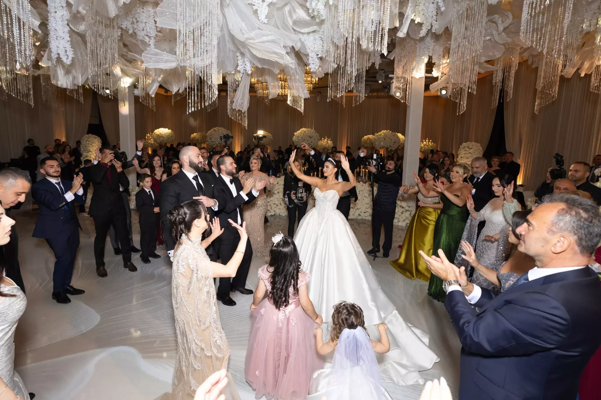Guests celebrating at an Armenian wedding inside an L.A. banquet hall